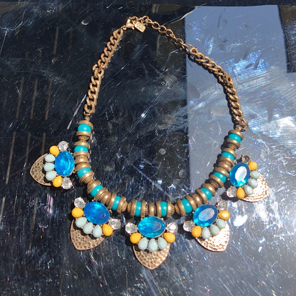 Turquoise, yellow, and gold necklace.